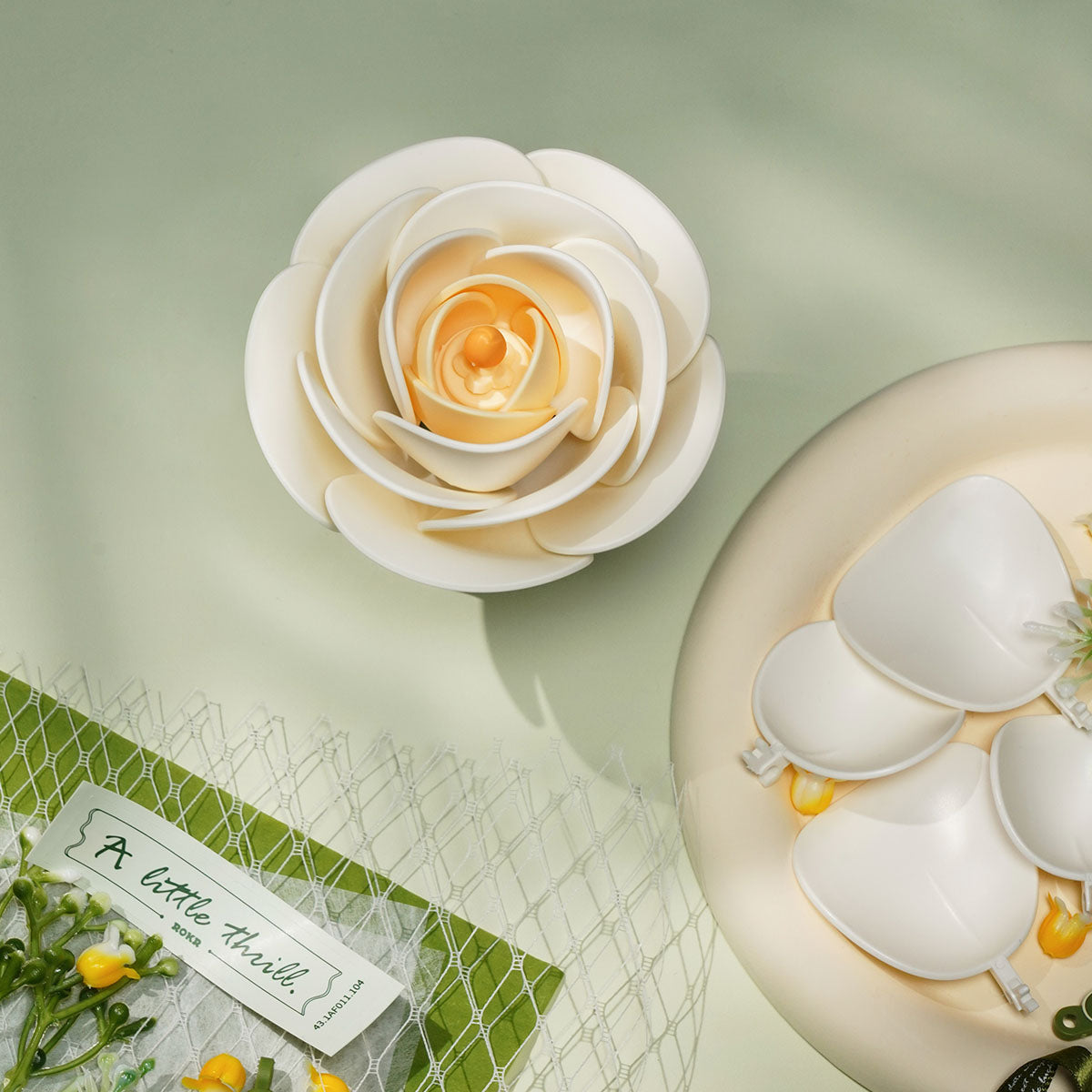 White Camellia snap-fit assembly details