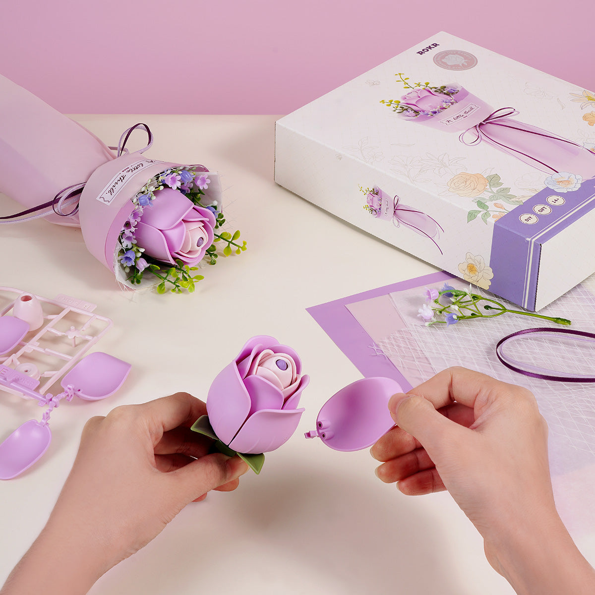 Purple Rose floral puzzle held as a lasting bouquet