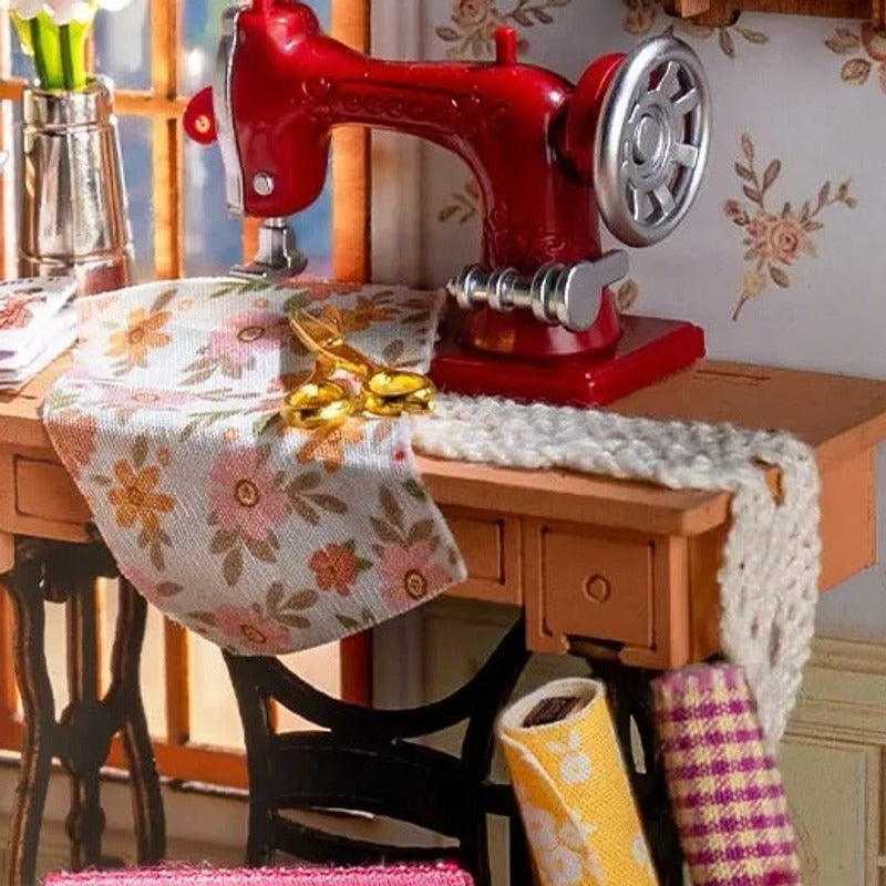 The red sewing machine by the window