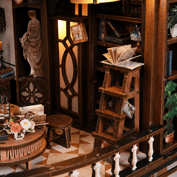 An open book atop a little step ladder