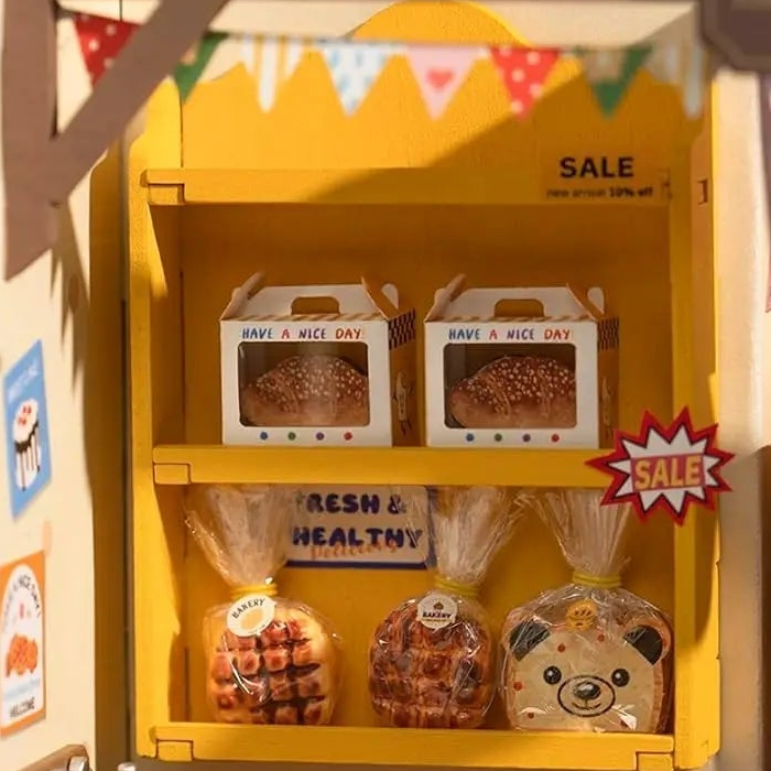 Boxed loaves and wrapped bread line the bright yellow shelves.