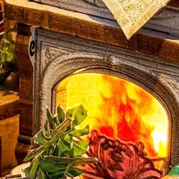 An ornate little fireplace