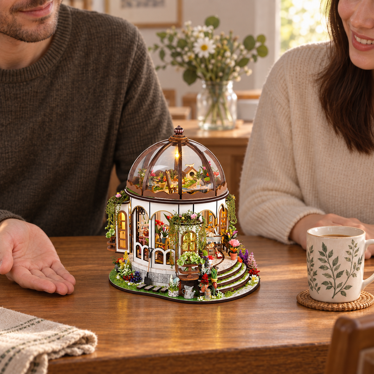 Generated display illustration of the completed Hanging Garden conservatory with two adults