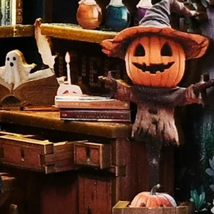 A pumpkin guardian by the spellbook
