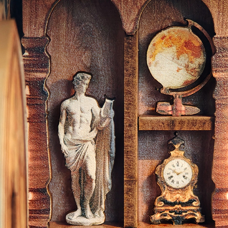 A globe and small treasures on the shelves