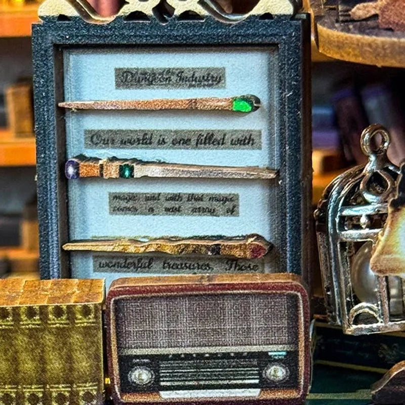Three miniature wands sit above a vintage-style radio.