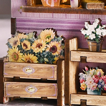 Sunflowers in the little drawers by the door