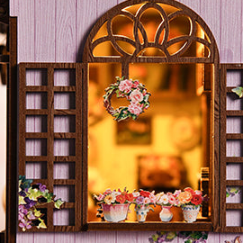 A floral wreath inside the arched side window