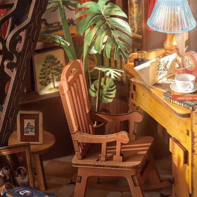 A rocking chair beside the writing desk