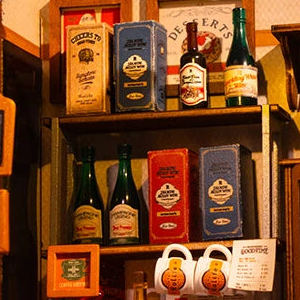 Bottles and hanging cups behind the bar