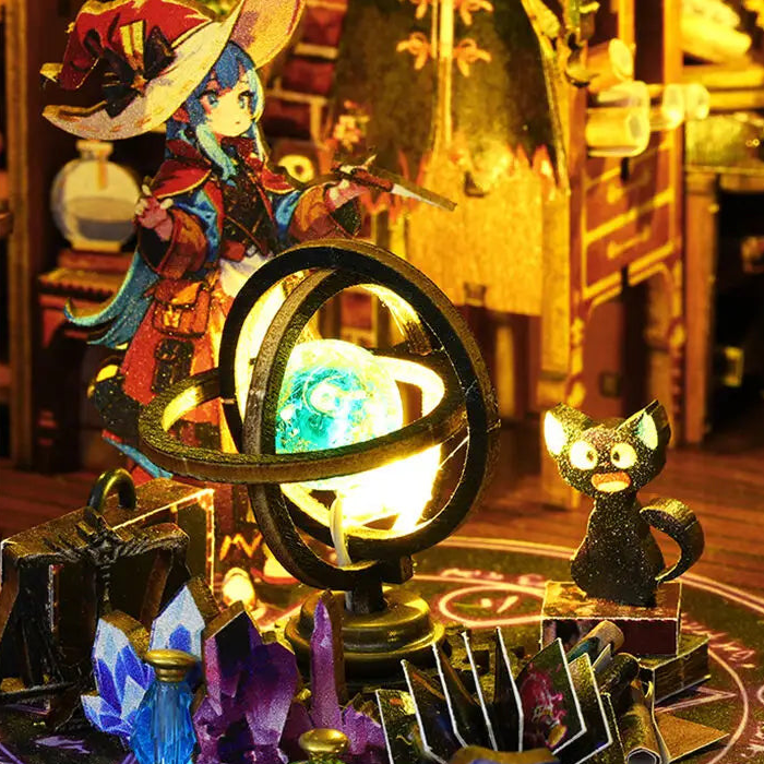 A crystal ball, books and a watchful cat