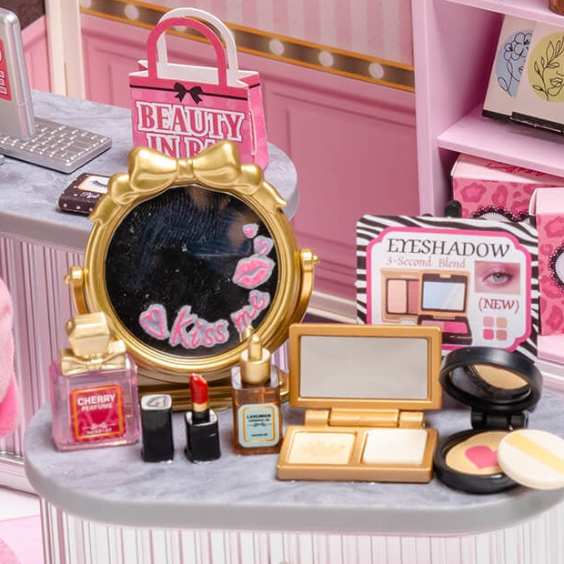 Tiny cosmetics beneath a bow-topped mirror