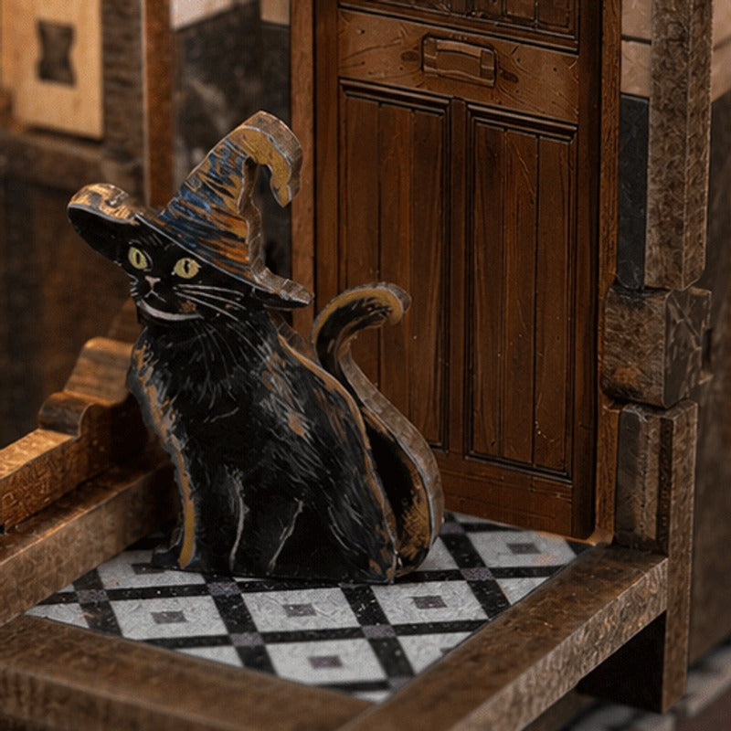 A little black cat keeps watch from the shop floor.