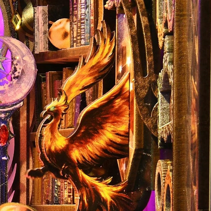 A golden phoenix above the shelves
