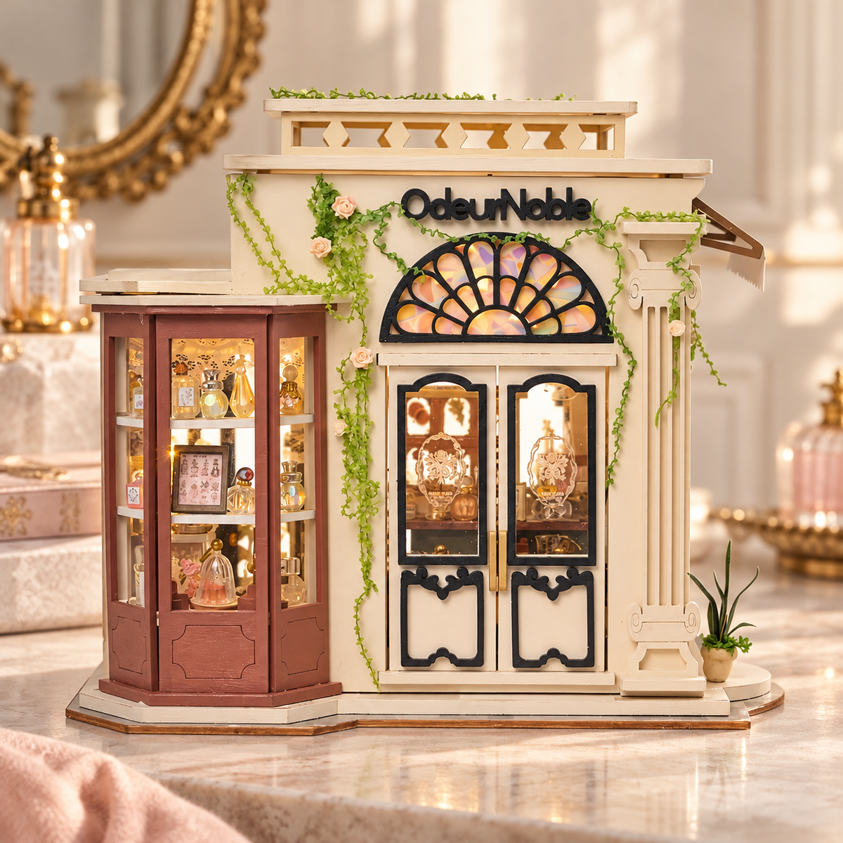Odeur Noble cream miniature perfume shop with black double doors and a lit perfume cabinet