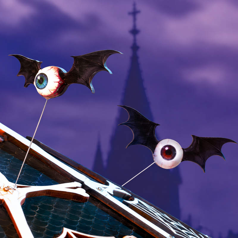 Flying-eye bats hover above the carousel.