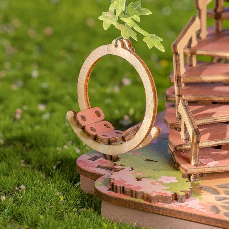 A hanging seat beside the winding stairs