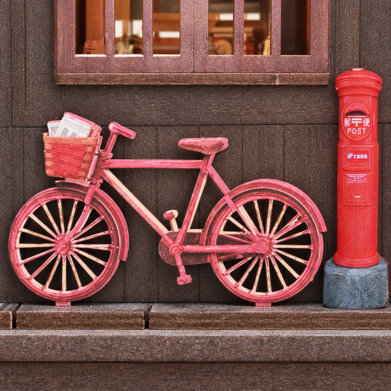A bicycle by the postbox