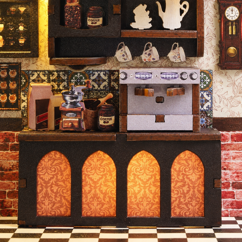 Tiny mugs above the coffee machine, with a grinder close by.
