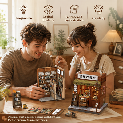 Two adults assembling Antique Bookery of Kyoto miniature kit