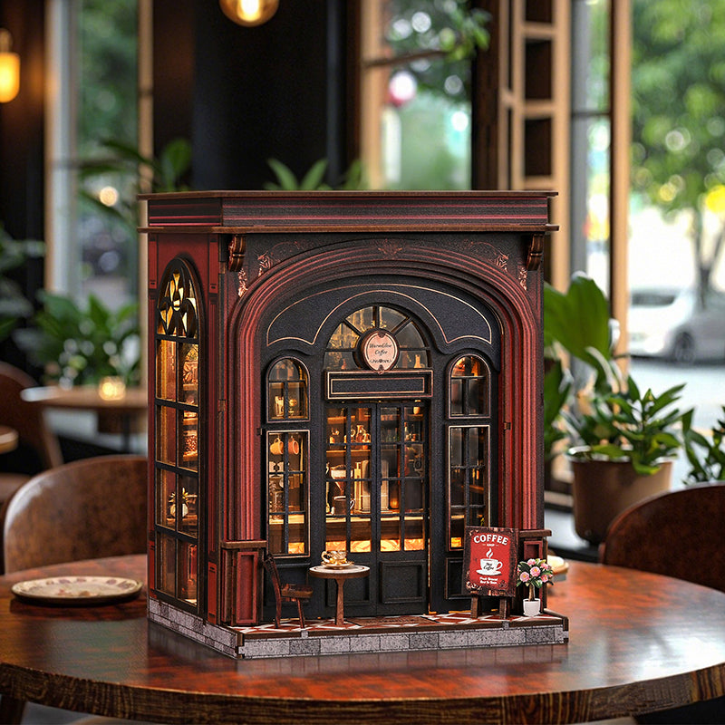 Warmglow Coffee miniature café displayed on a table beside sunlit windows and plants