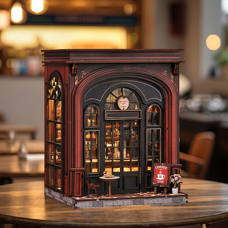 Warmglow Coffee with warm light behind its arched windows in a cozy café setting