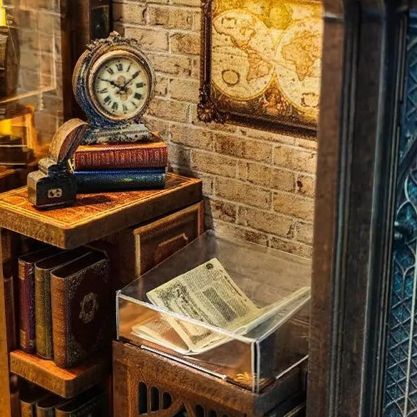A vintage clock above open pages