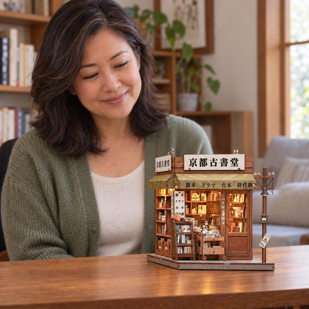 Antique Bookery of Kyoto — completed miniature in a sharing scene (AI-assisted visualization)