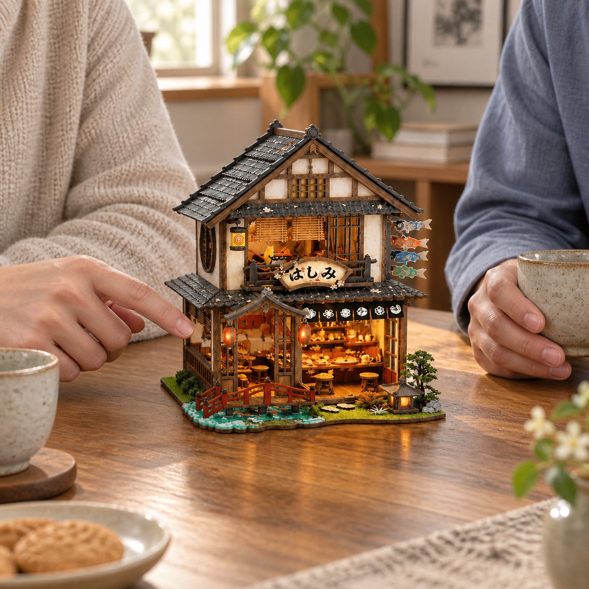 Bridgeside Machiya — finished miniature in an everyday setting (AI-assisted visualization)