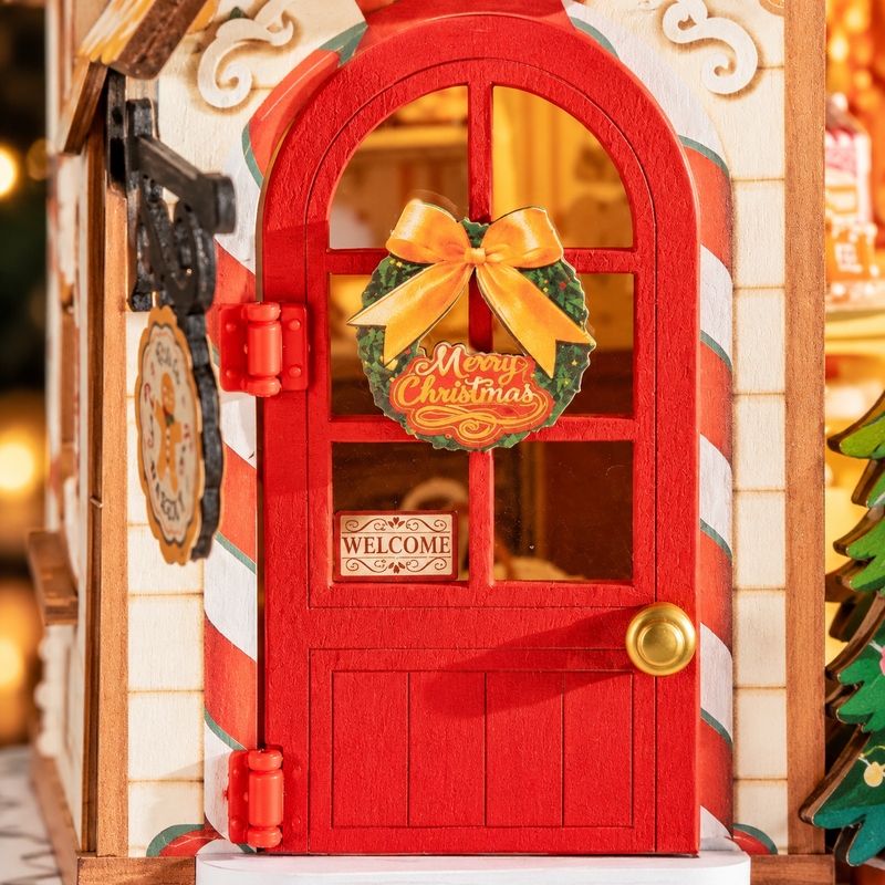 A gold-bowed wreath on the red door