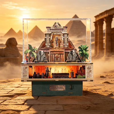 Illuminated Egyptian pyramid miniature displayed on a table