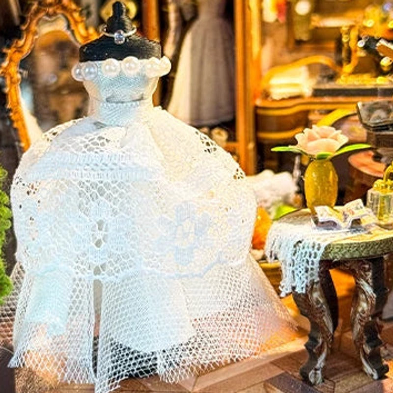 A lace gown at the heart of it
