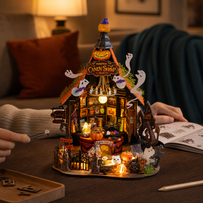 Building Haunted Candy House DG186 miniature kit in a warm maker's corner