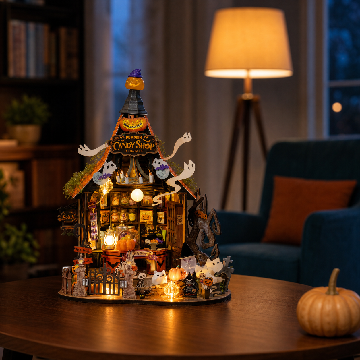 Haunted Candy House DG186 illuminated as Halloween home decor at dusk
