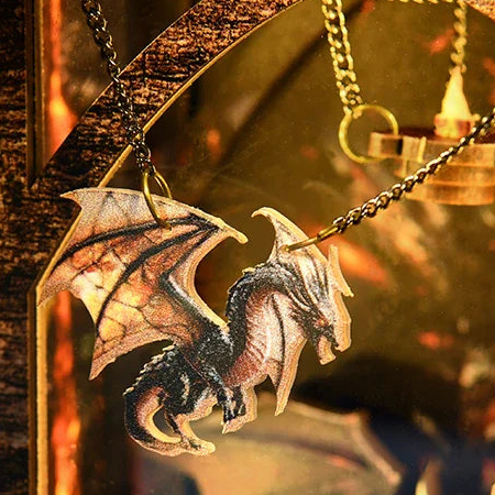 A little dragon suspended beneath the arch