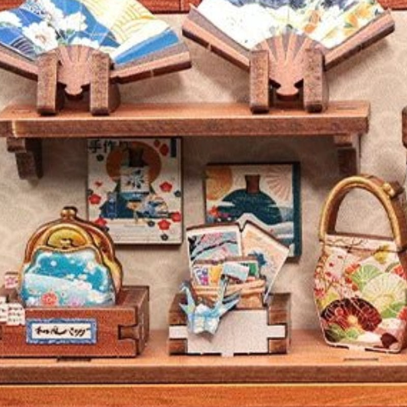 Fans and tiny patterned bags