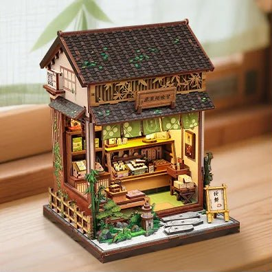 Completed Kurihara Sweet Shop on a wooden table by a window, cropped from the original photograph