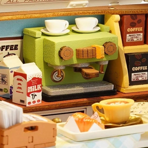 A tiny espresso machine behind the counter