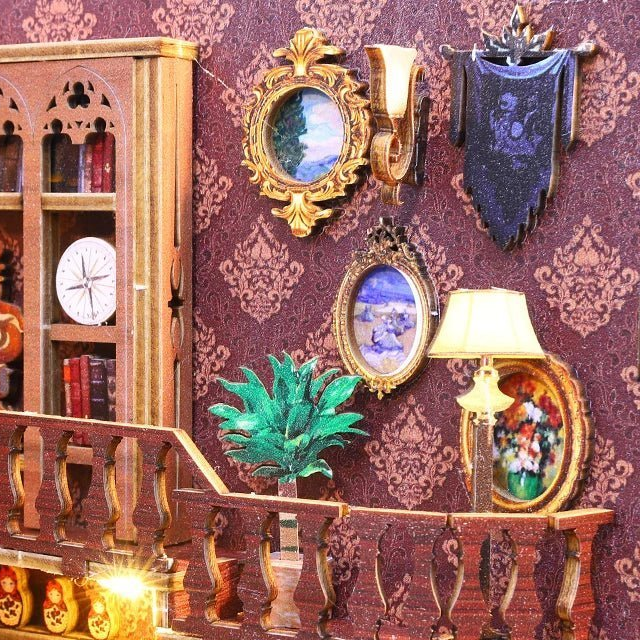 Oval pictures hang above a potted plant behind the balcony rail.