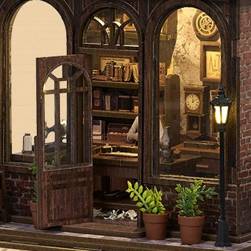 An arched front door that opens into the workshop