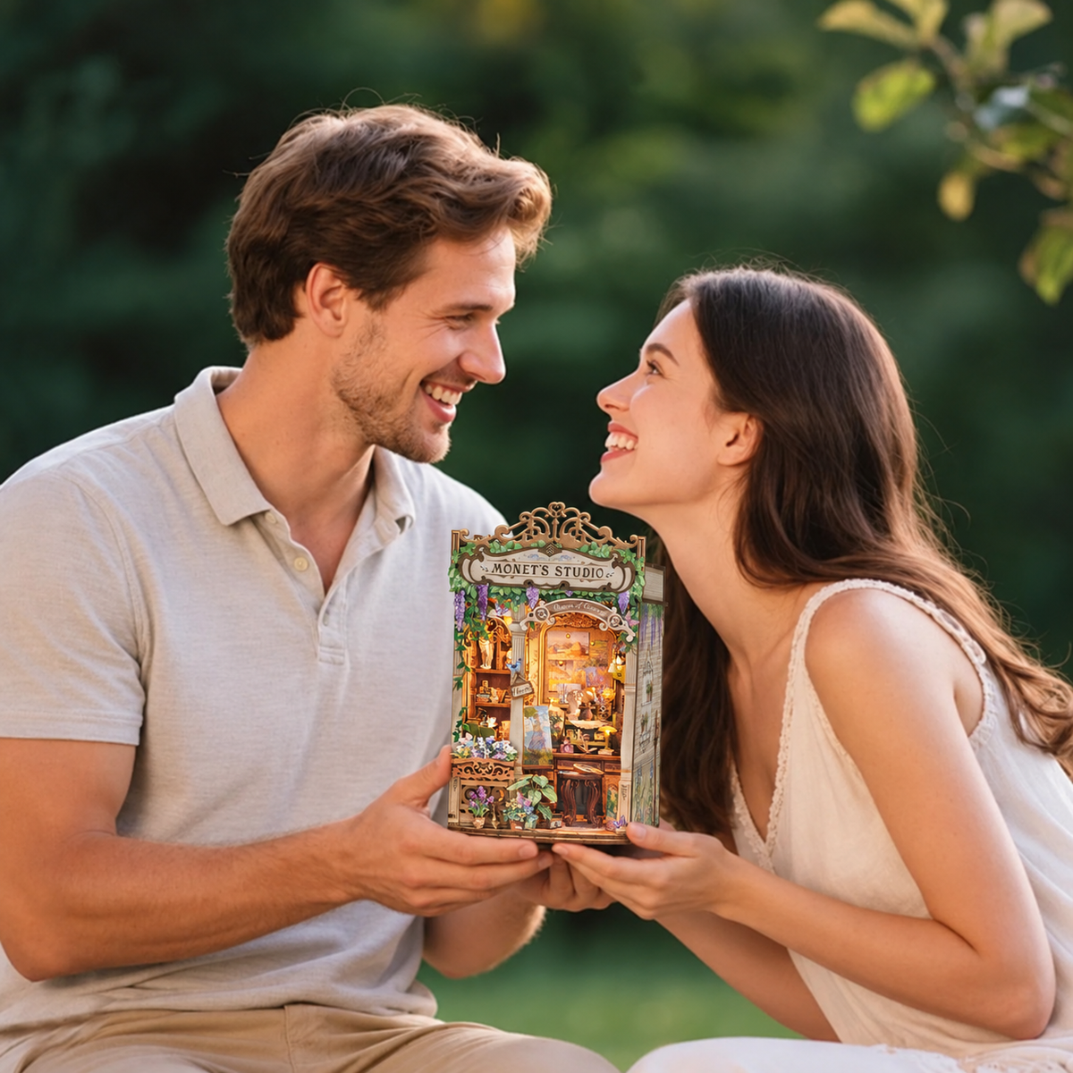 Generated display scene of two adults holding the completed Monet’s Impression book nook