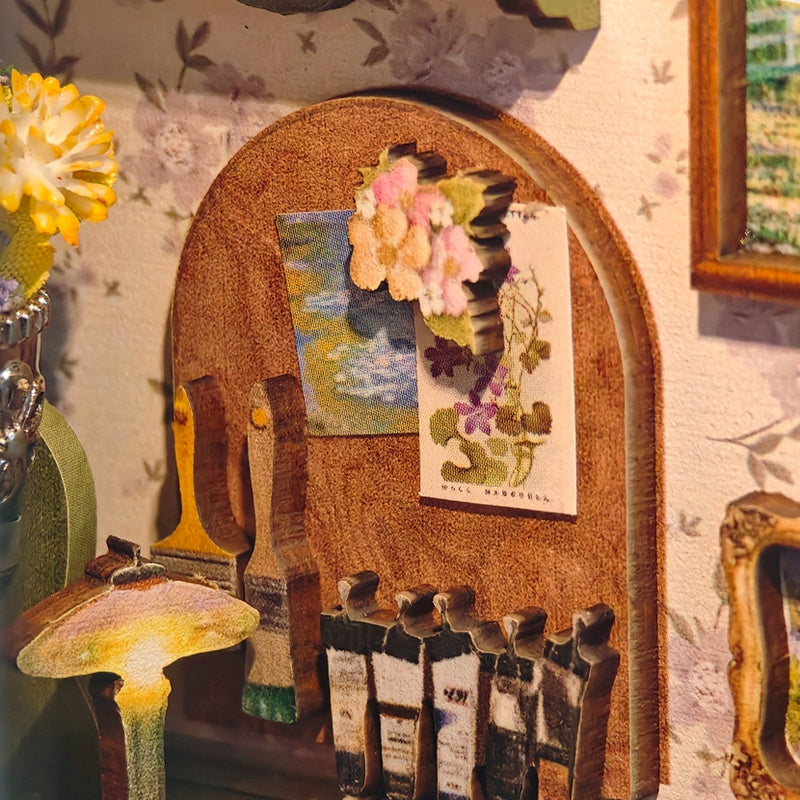 Pictures and painting tools on the studio wall