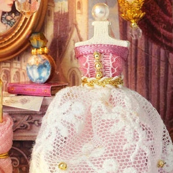 A gown dressed in delicate lace