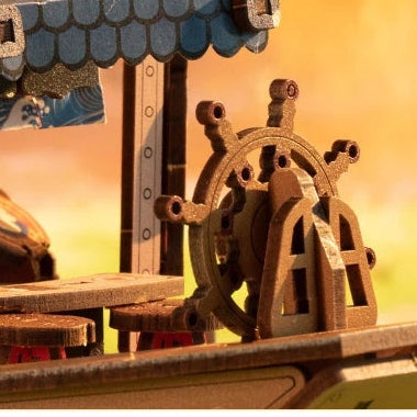 A tiny helm at the bow