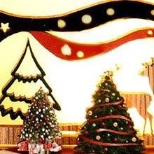 A lit winter illustration gives the gift counter its own glow.