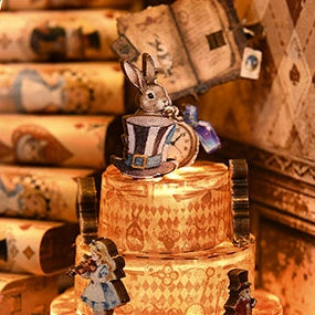 A rabbit-topped cake with a turning mechanism