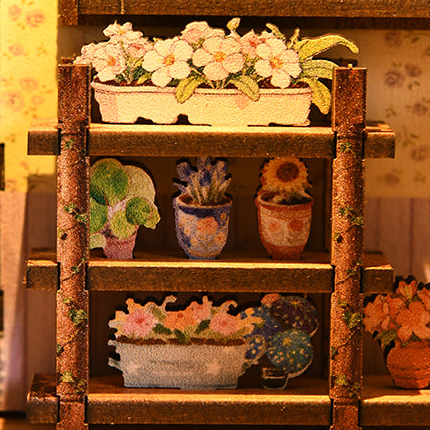 Printed flower pots on a tiered wooden shelf