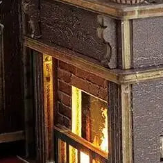A warm glow inside the little stove