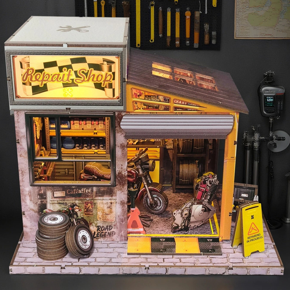 Original elevated view of the complete Motorcycle Repair Shop miniature with its paved base