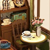 A cup and flowers at the window table